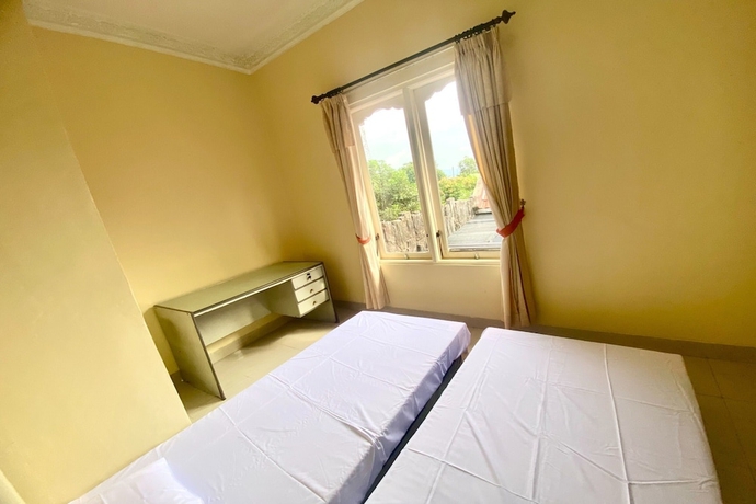 Imagen de la habitación del Hotel SPOT ON 93711 Kenzie Bunkbed Syariah. Foto 10