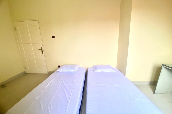 Imagen de la habitación del Hotel SPOT ON 93711 Kenzie Bunkbed Syariah. Foto 12