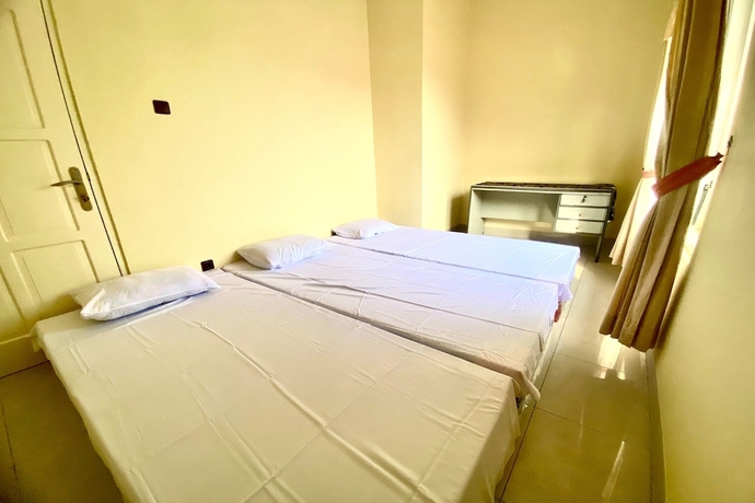 Imagen de la habitación del Hotel SPOT ON 93711 Kenzie Bunkbed Syariah. Foto 13