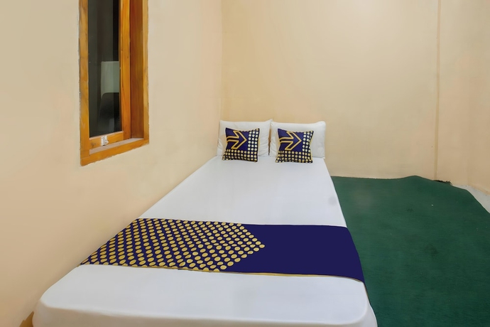 Imagen de la habitación del Hotel SPOT ON 93724 Songgong Homestay. Foto 4