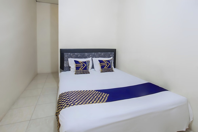 Imagen de la habitación del Hotel SPOT ON 93724 Songgong Homestay. Foto 6
