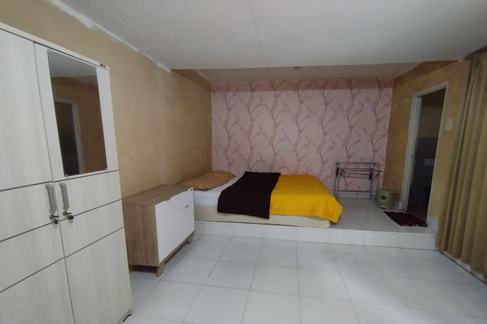 Imagen de la habitación del Hotel SPOT ON 93739 Insanta. Foto 6