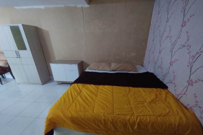 Imagen de la habitación del Hotel SPOT ON 93739 Insanta. Foto 9