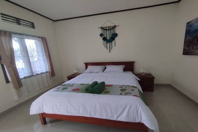 Imagen de la habitación del Hotel SPOT ON 93739 Insanta. Foto 10