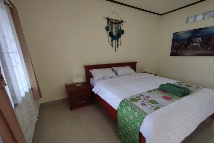 Imagen de la habitación del Hotel SPOT ON 93739 Insanta. Foto 11