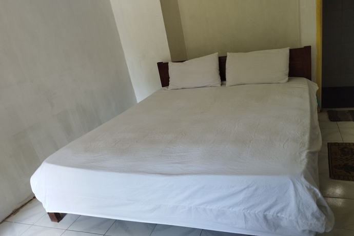 Imagen de la habitación del Hotel SPOT ON 93740 Madame Guesthouse. Foto 2