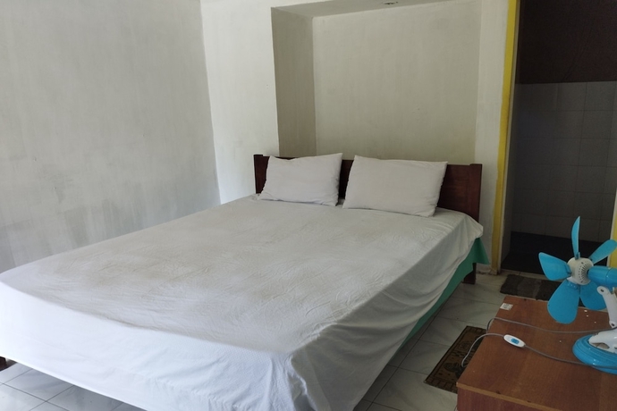 Imagen de la habitación del Hotel SPOT ON 93740 Madame Guesthouse. Foto 3