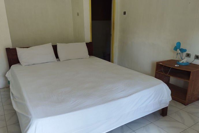 Imagen de la habitación del Hotel SPOT ON 93740 Madame Guesthouse. Foto 4