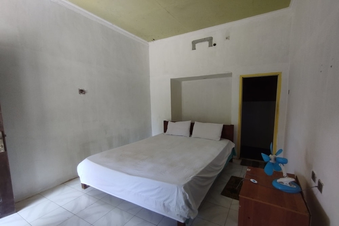 Imagen de la habitación del Hotel SPOT ON 93740 Madame Guesthouse. Foto 7