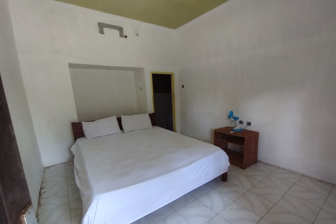Imagen de la habitación del Hotel SPOT ON 93740 Madame Guesthouse. Foto 8