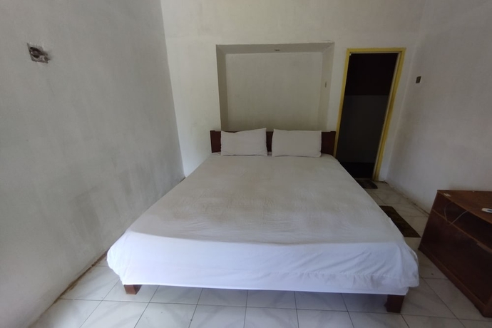 Imagen de la habitación del Hotel SPOT ON 93740 Madame Guesthouse. Foto 9