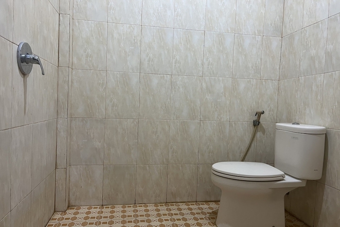 Imagen de la habitación del Hotel SPOT ON 93740 Madame Guesthouse. Foto 10