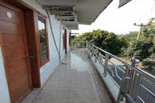 Imagen general del Hotel SPOT ON 94033 Harapan Jaya. Foto 6