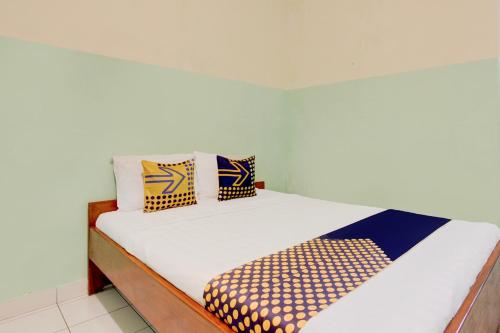 Imagen de la habitación del Hotel SPOT ON 94211 Pondok Wisata Kaliandra Kaliurang. Foto 20