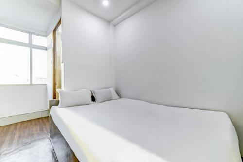 Imagen de la habitación del Hotel SPOT ON Plaza Guest House. Foto 19
