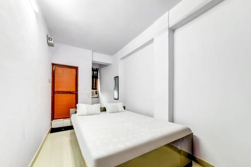 Imagen de la habitación del Hotel SPOT ON Plaza Guest House. Foto 20