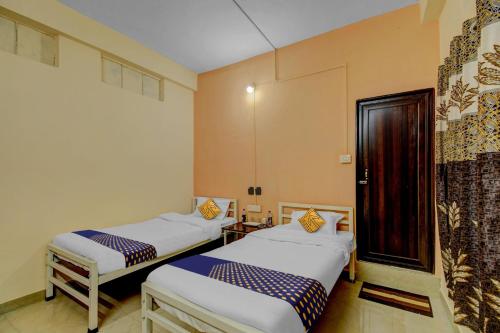 Imagen de la habitación del Hotel SPOT ON Rainbow Lodge. Foto 15