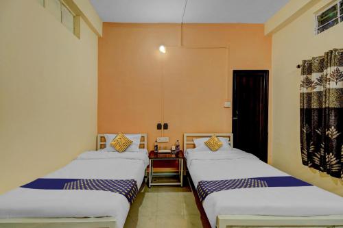 Imagen de la habitación del Hotel SPOT ON Rainbow Lodge. Foto 17