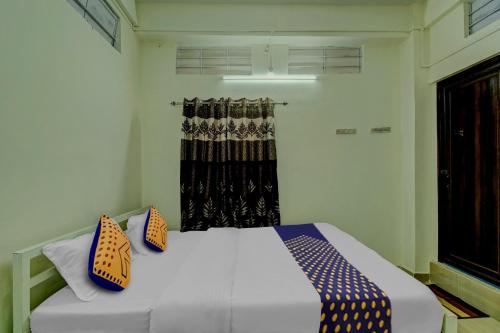 Imagen de la habitación del Hotel SPOT ON Rainbow Lodge. Foto 18