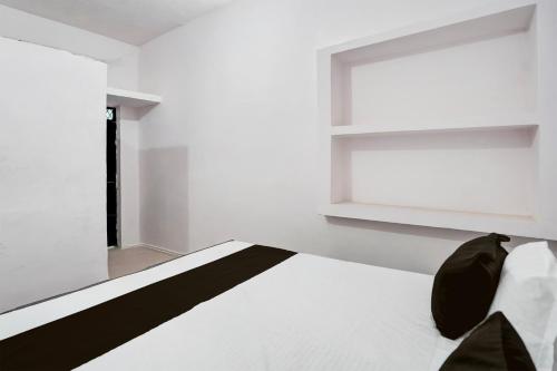 Imagen de la habitación del Hotel SPOT ON THE HOTEL PARADISE. Foto 13