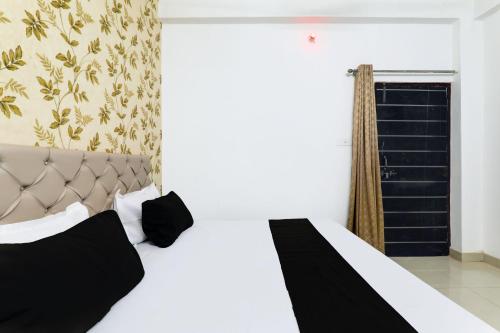 Imagen de la habitación del Hotel SPOT ON THE RUSTIC INN GUEST HOUSE. Foto 13