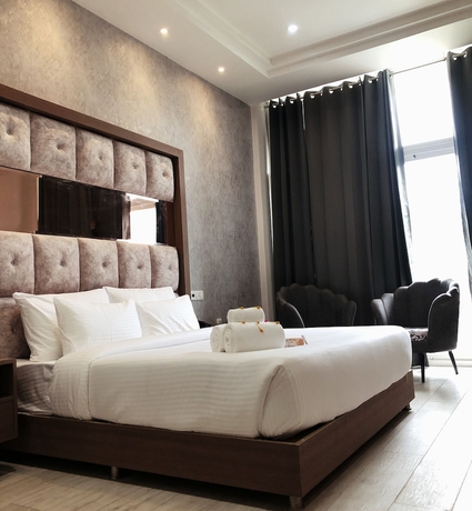 Imagen de la habitación del Hotel SPT Clarks Inn Suite Mandi. Foto 3