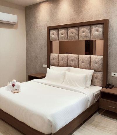 Imagen de la habitación del Hotel SPT Clarks Inn Suite Mandi. Foto 6