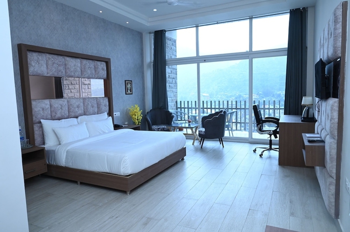 Imagen de la habitación del Hotel SPT Clarks Inn Suite Mandi. Foto 8