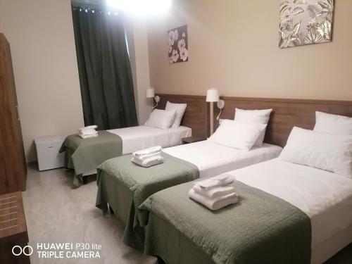 Imagen de la habitación del Hotel SQUARE HOTEL. Foto 18