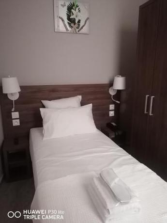 Imagen de la habitación del Hotel SQUARE HOTEL, Nimes. Foto 19