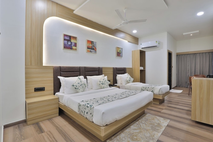 Imagen de la habitación del Hotel SR Laxmi. Foto 2
