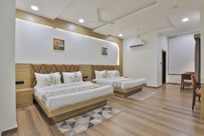 Imagen de la habitación del Hotel SR Laxmi. Foto 14