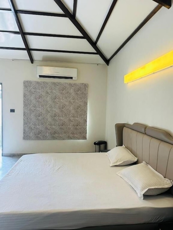 Imagen de la habitación del Hotel SRK Farm and Resort. Foto 5