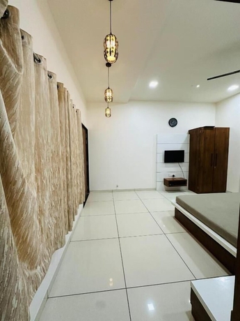 Imagen de la habitación del Hotel SRK Farm and Resort. Foto 8