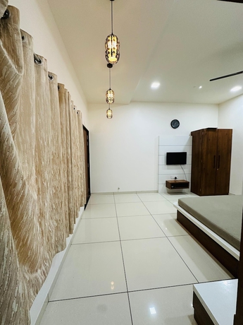 Imagen de la habitación del Hotel SRK Farm and Resort. Foto 11