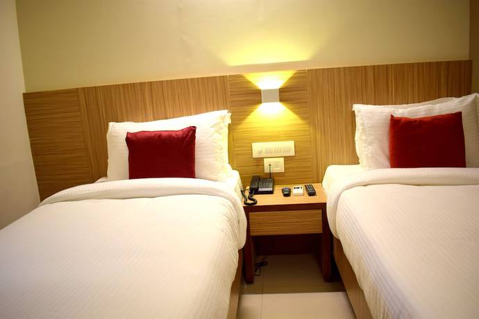 Imagen de la habitación del Hotel SRTC Aspire. Foto 5