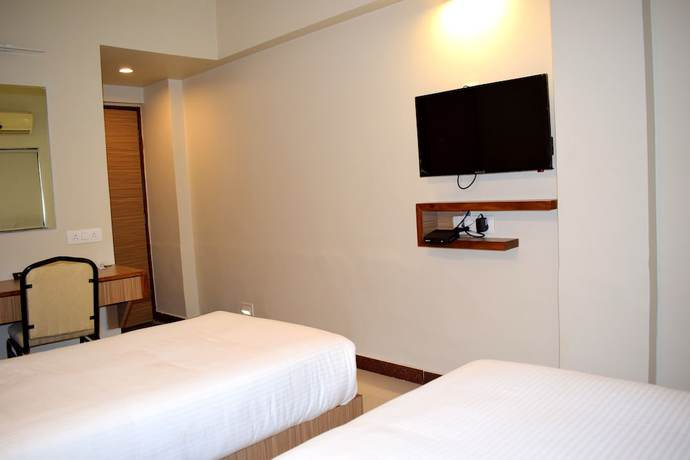 Imagen de la habitación del Hotel SRTC Aspire. Foto 9