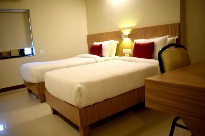 Imagen de la habitación del Hotel SRTC Aspire. Foto 14