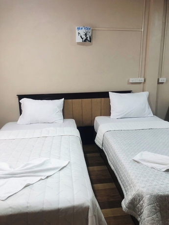 Imagen de la habitación del Hotel SS GUESTHOUSE. Foto 9