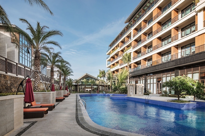 Imagen de la piscina del Hotel SSAW BOUTIQUE HOTEL SANYA HAITANG BAY. Foto 15