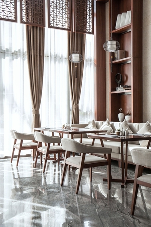Imagen del bar/restaurante del Hotel SSAW BOUTIQUE HOTEL SANYA HAITANG BAY. Foto 4