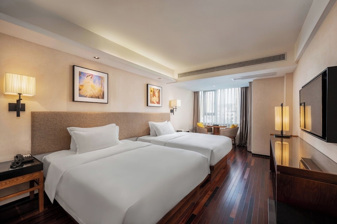 Imagen de la habitación del Hotel SSAW Boutique Hotel Sanya Dadonghai. Foto 2