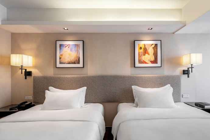 Imagen de la habitación del Hotel SSAW Boutique Hotel Sanya Dadonghai. Foto 3