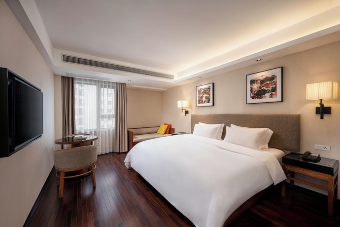 Imagen de la habitación del Hotel SSAW Boutique Hotel Sanya Dadonghai. Foto 6