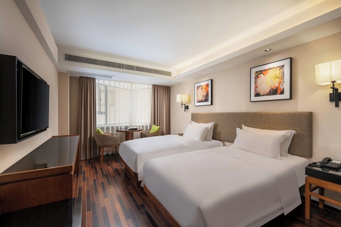 Imagen de la habitación del Hotel SSAW Boutique Hotel Sanya Dadonghai. Foto 10