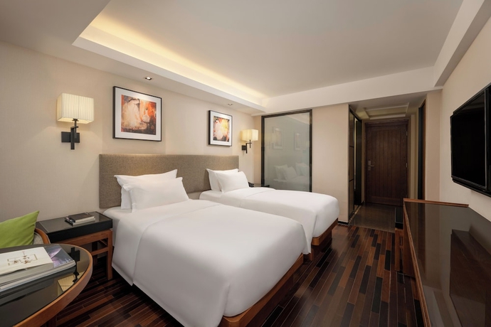 Imagen de la habitación del Hotel SSAW Boutique Hotel Sanya Dadonghai. Foto 11