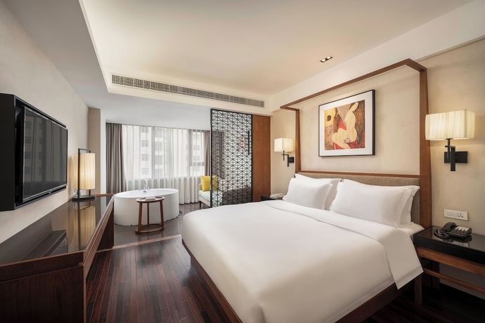 Imagen de la habitación del Hotel SSAW Boutique Hotel Sanya Dadonghai. Foto 12