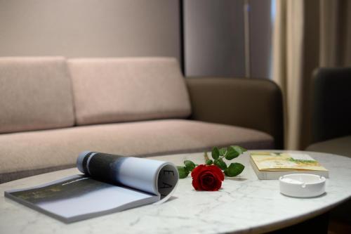 Imagen de la habitación del Hotel SSAW Boutique Wenzhou Dexin. Foto 13