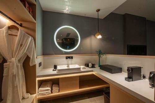 Imagen de la habitación del Hotel SSAW Boutique Wenzhou Dexin. Foto 16