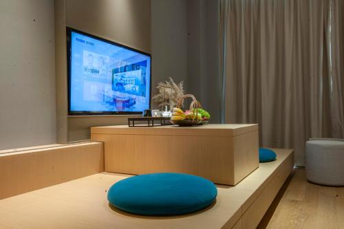 Imagen de la habitación del Hotel SSAW Boutique Wenzhou Dexin. Foto 17